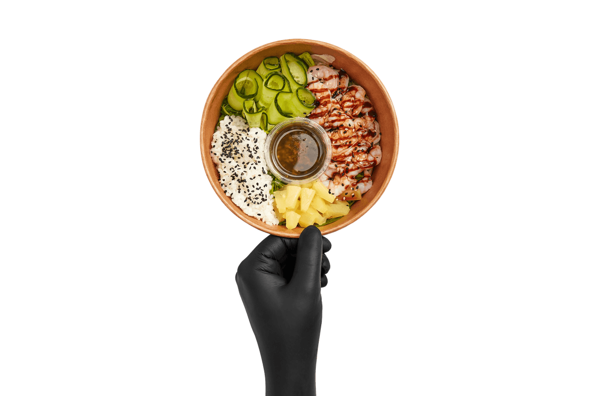 Hand holding a healthy bowl